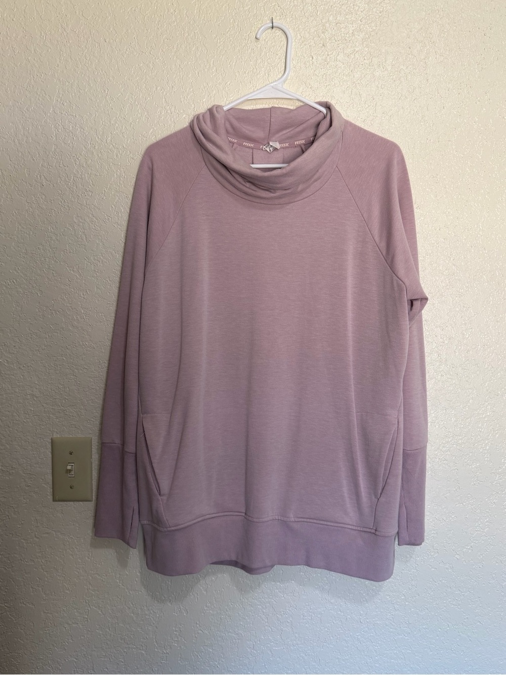Women’s RBX cowl neck sweatshirt.
